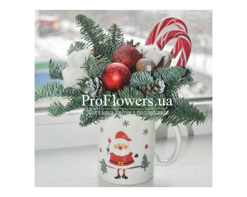 Квіти декоративні у чашці